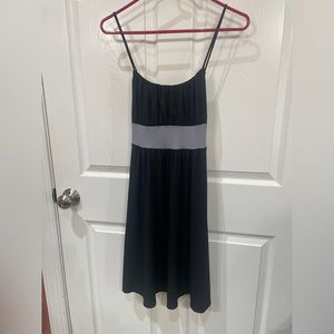 Wrapper size medium black with silver sash